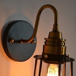 Minimalist Artistic Wall Light with Black Metal Skeleton Shade
